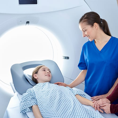 Healthcare professional supporting a patient during treatment – BSc Radiotherapy and Oncology