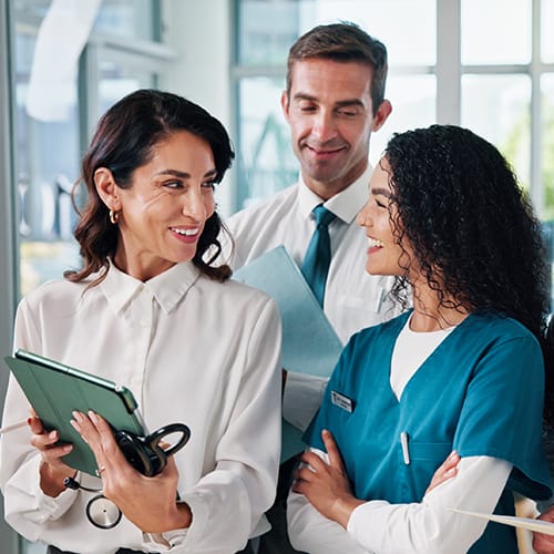 Graduate in Health Care Administration discussing with colleagues in Canada.