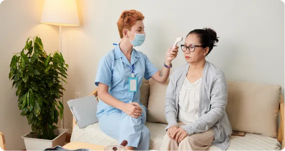 Nurse checking patient’s temperature at home care setting – Nursing in Australia