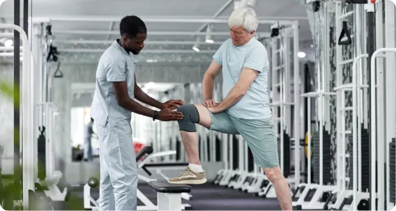 Master of Occupational Therapy student supporting a patient