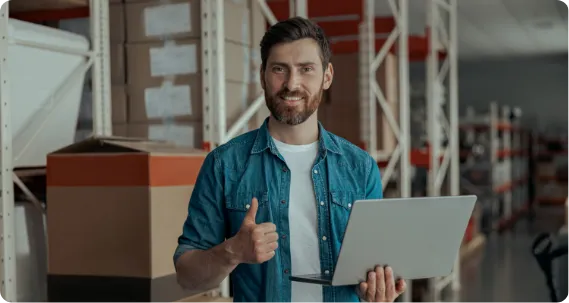 Student with laptop exploring career opportunities through MSc Engineering Management in UK.